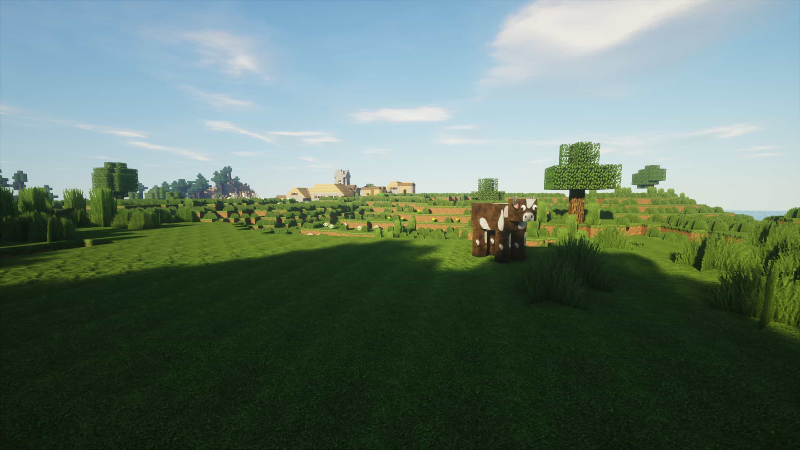 Une vache dans une prairie de Minecraft