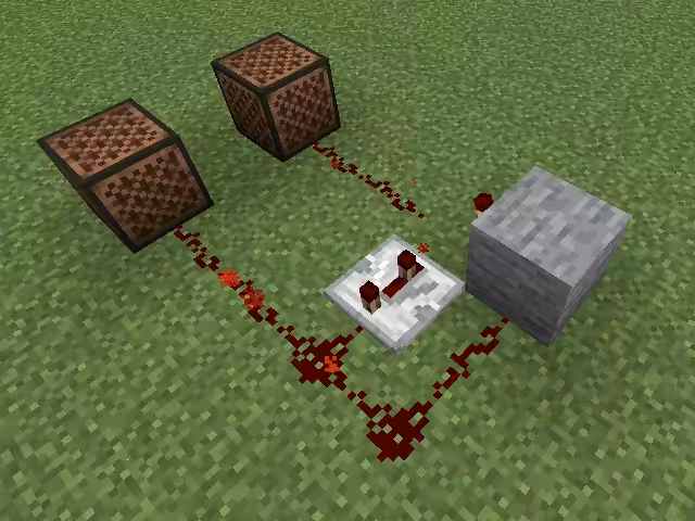 Deux blocs musicaux reliés à une horloge en redstone pour jouer en alternance dans Minecraft.