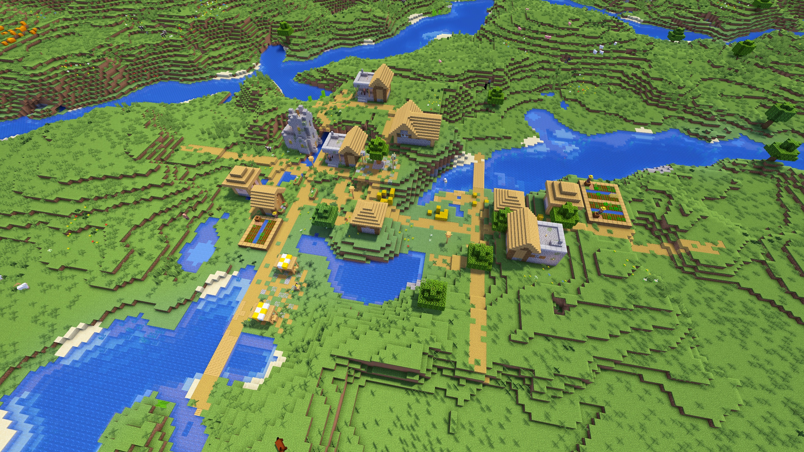 Village au spawn avec trois maisons de forgeron