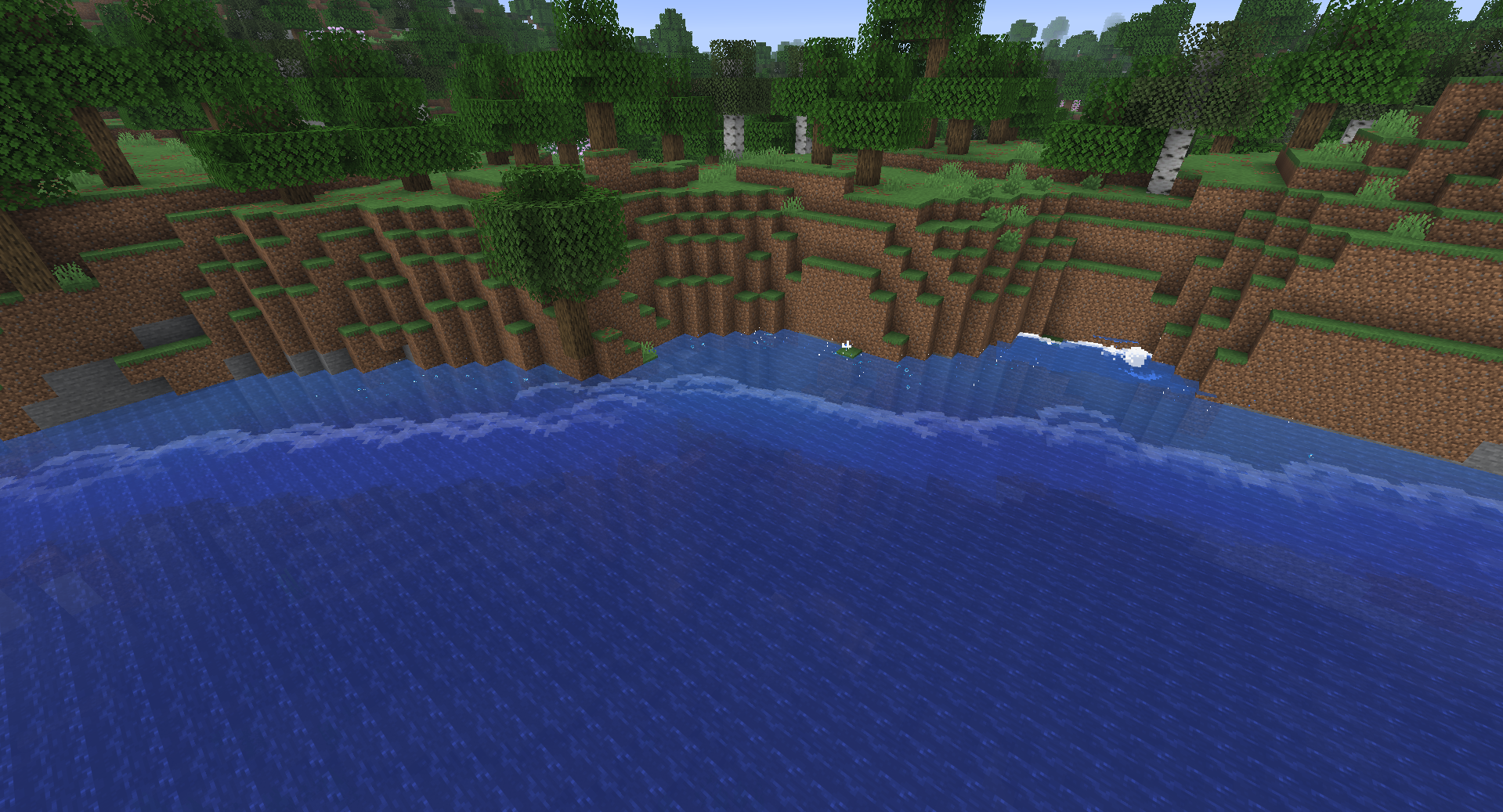 Effets de vagues du mod Wavify le long d’une côte escarpée dans Minecraft.