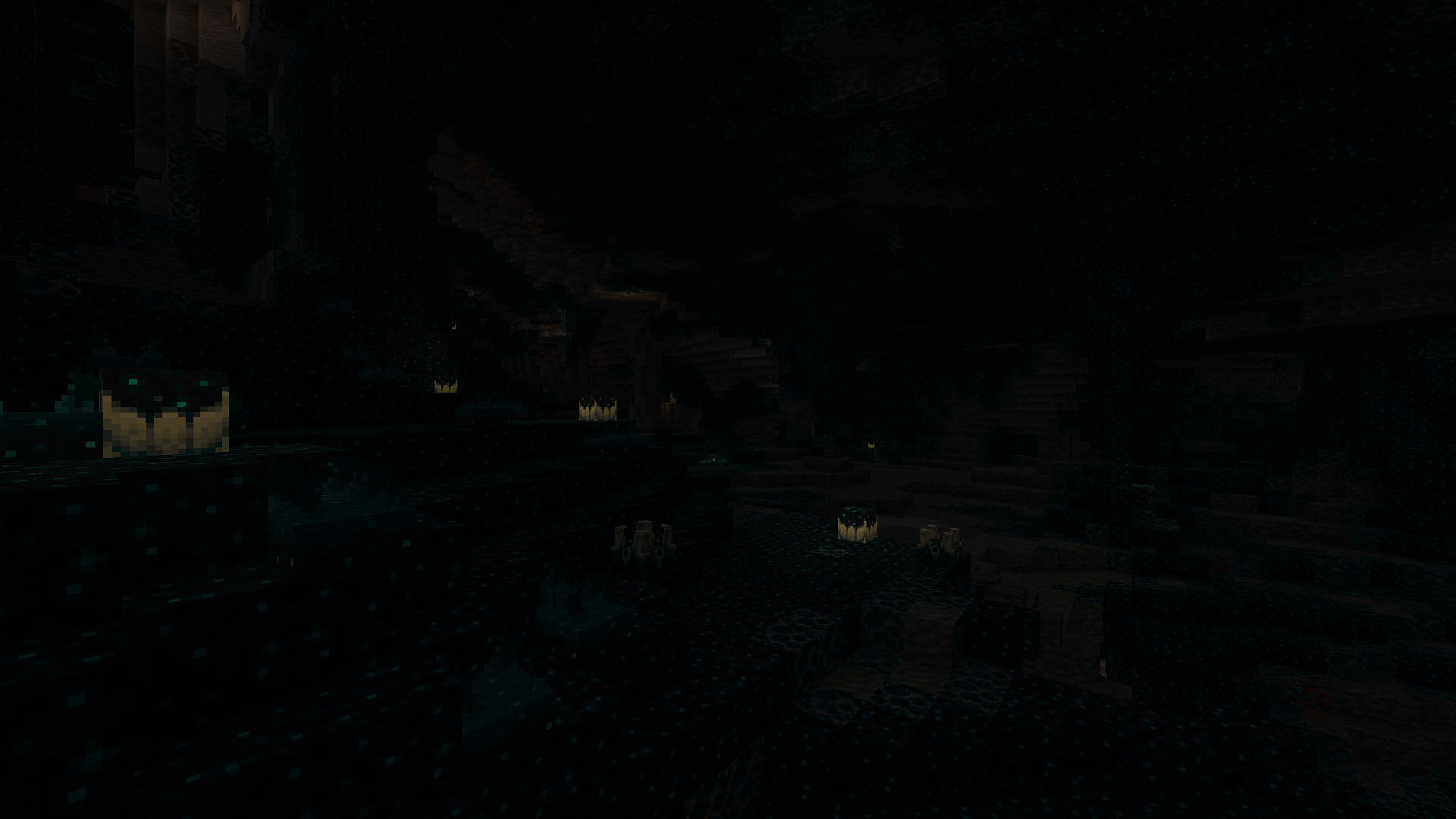 Vue d’ensemble des abîmes de Minecraft dans une grotte recouverte de sculk.