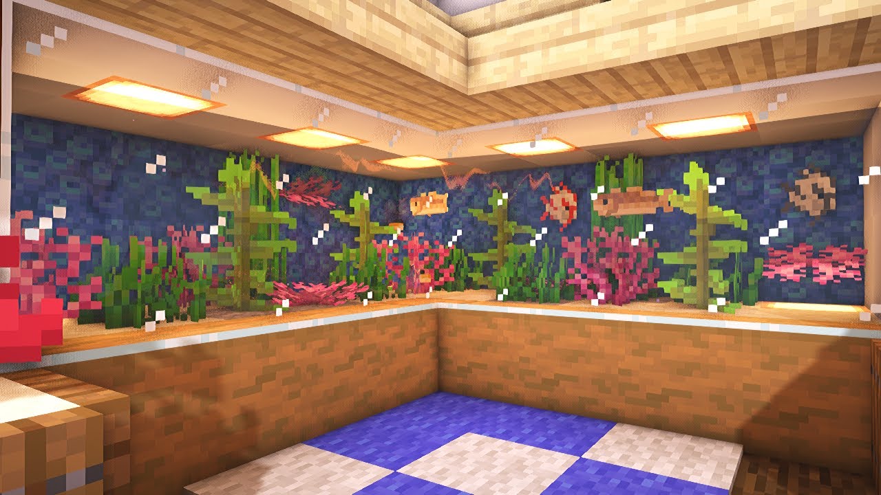 Aquarium Minecraft rempli de poissons tropicaux et de végétation aquatique.