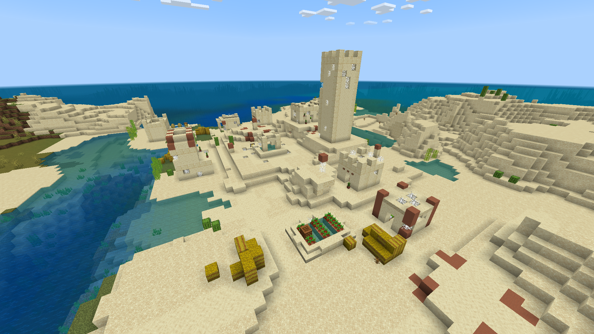 Village désertique abandonné dans Minecraft, avec maisons en grès au milieu du sable.