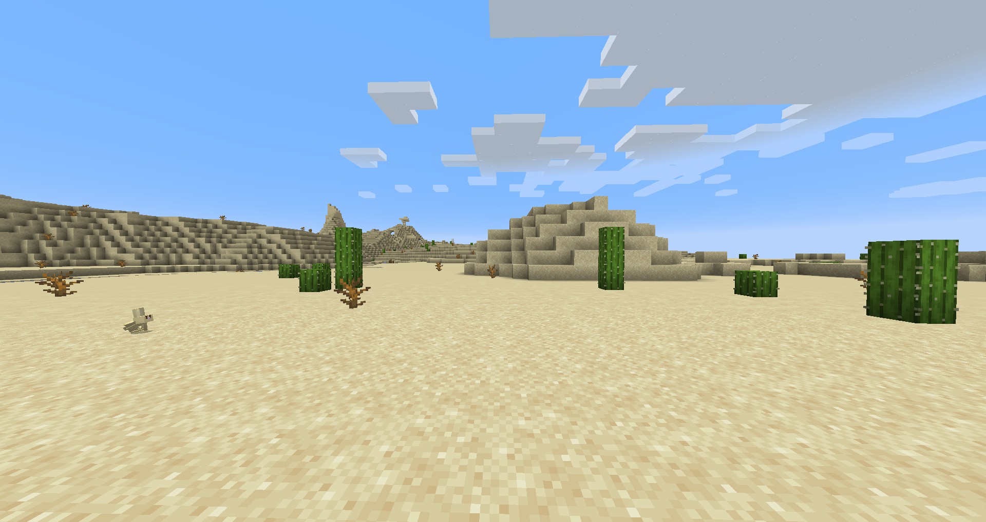 Cactus du désert dans Minecraft, avec une fleur de cactus rose à son sommet.