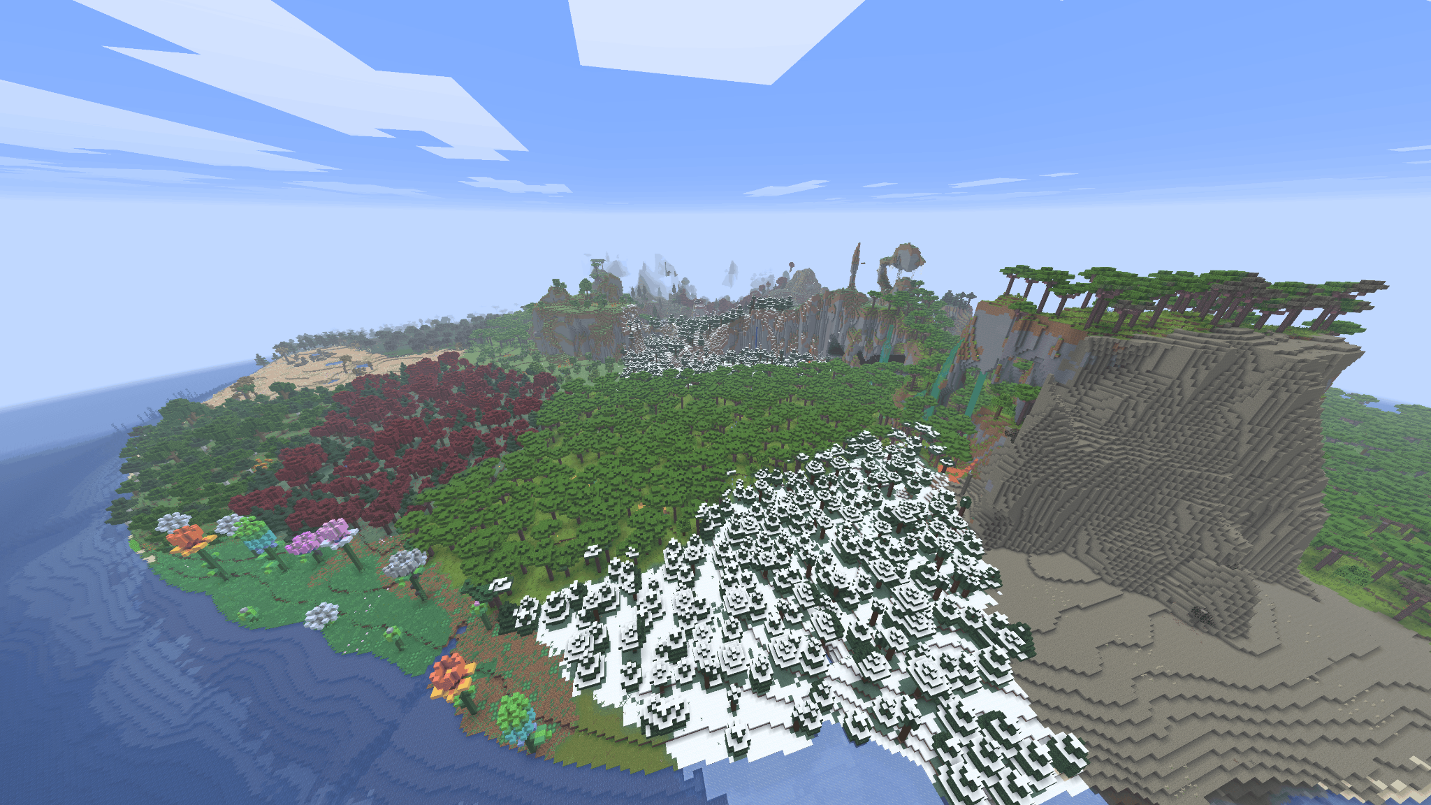 Île Minecraft avec forêt enneigée, désert, forêt rouge, jungle et montagnes regroupés sur un même territoire
