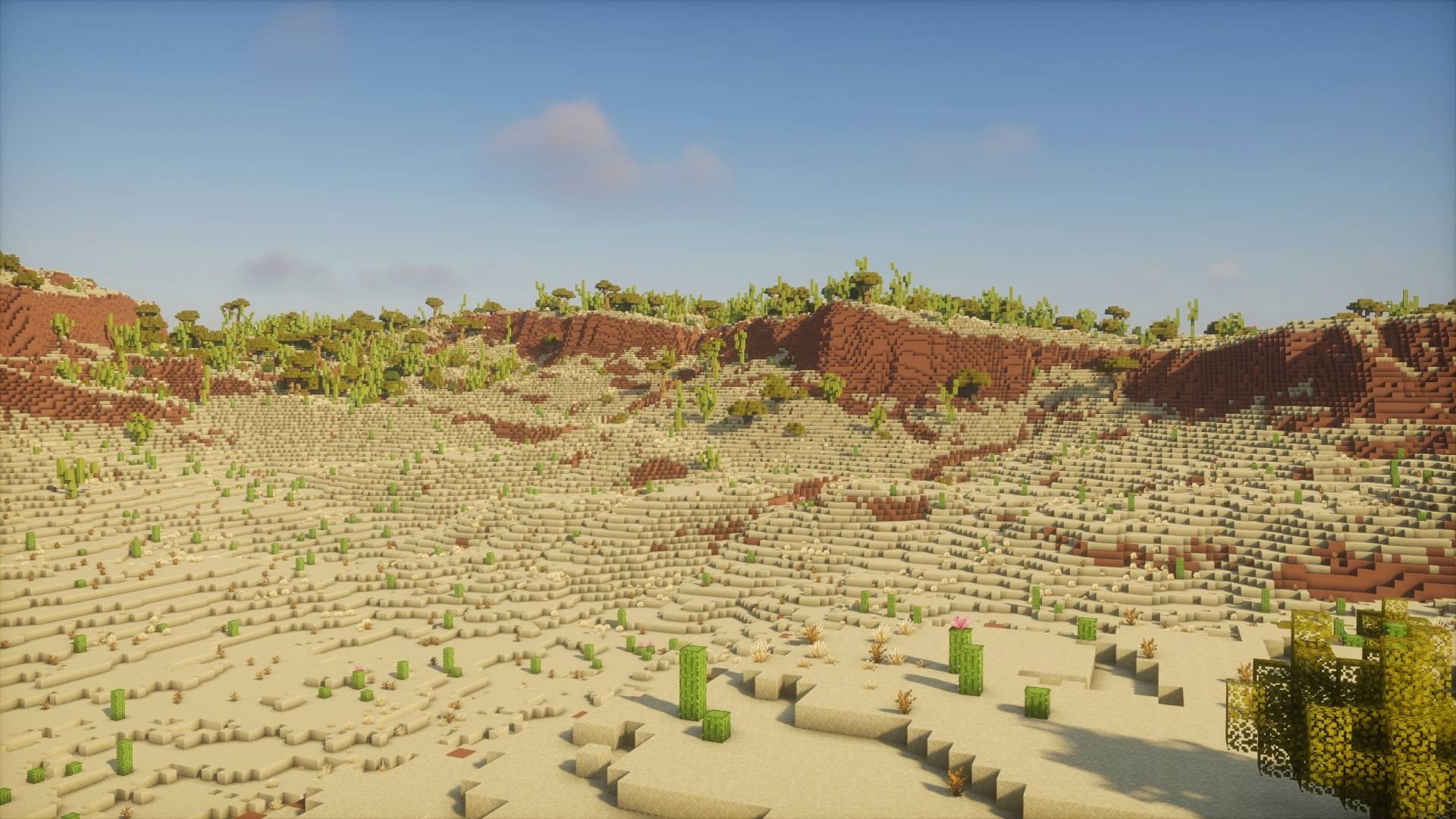 Vue du désert et des reliefs autour du Star Destroyer écrasé dans Minecraft