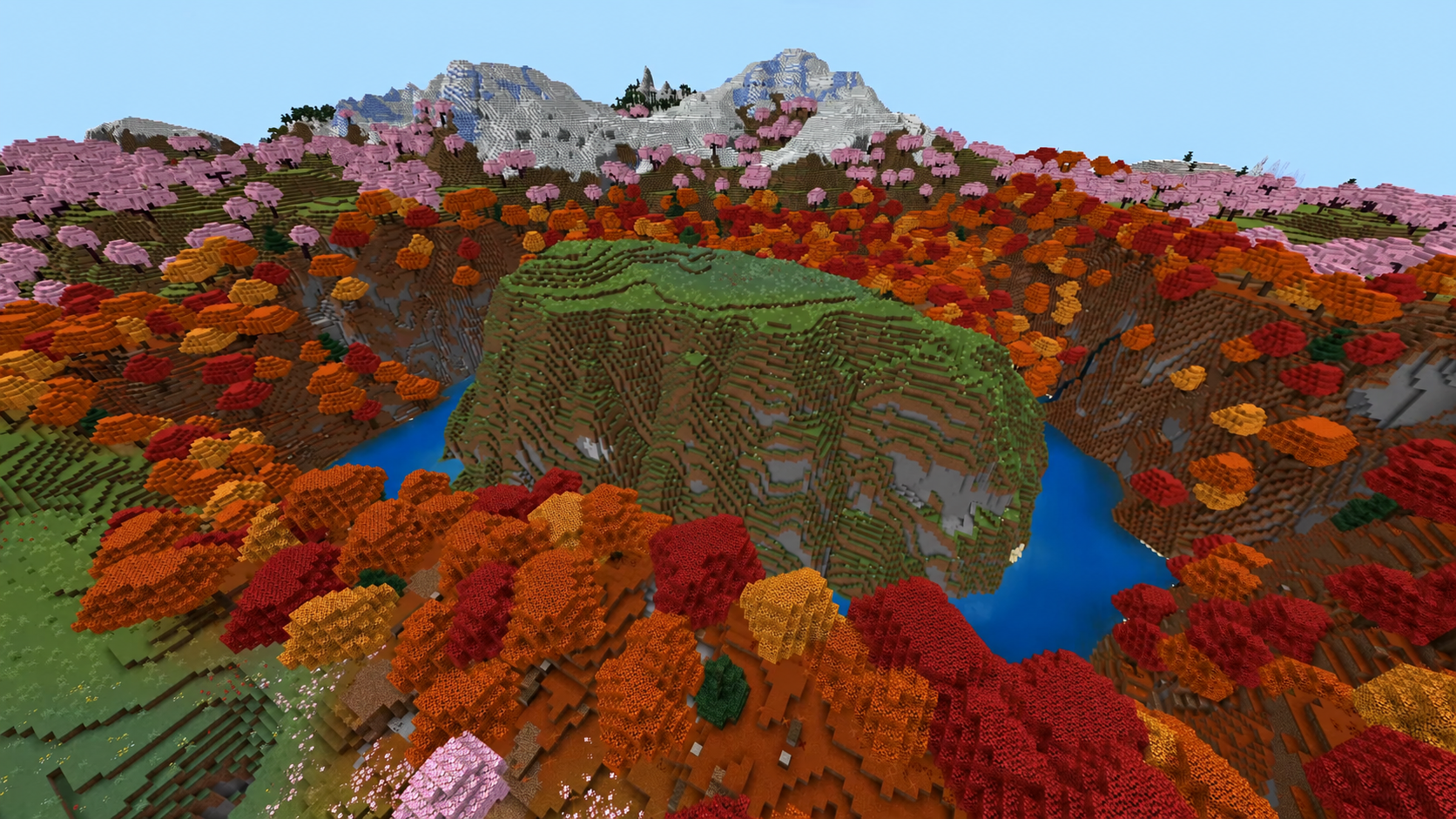 Prairie entourée de forêt ambrée et de montagnes dans Minecraft 26.3